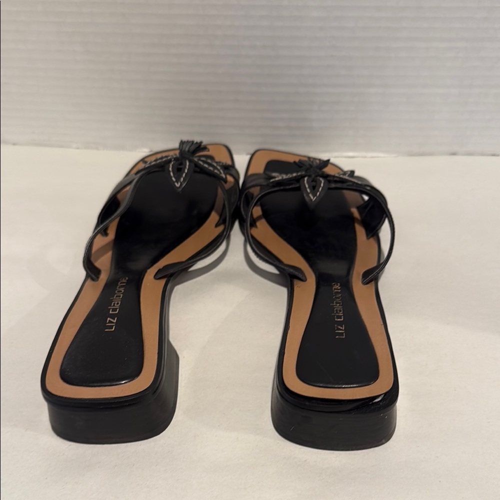 Liz Claiborne Black leather slip on Sandals with a flower. Size 9